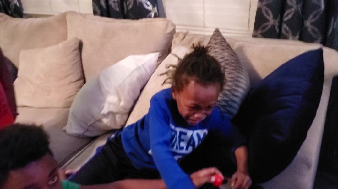 Miracle Baby Josiah Cries to play the Legends Gamer Pro